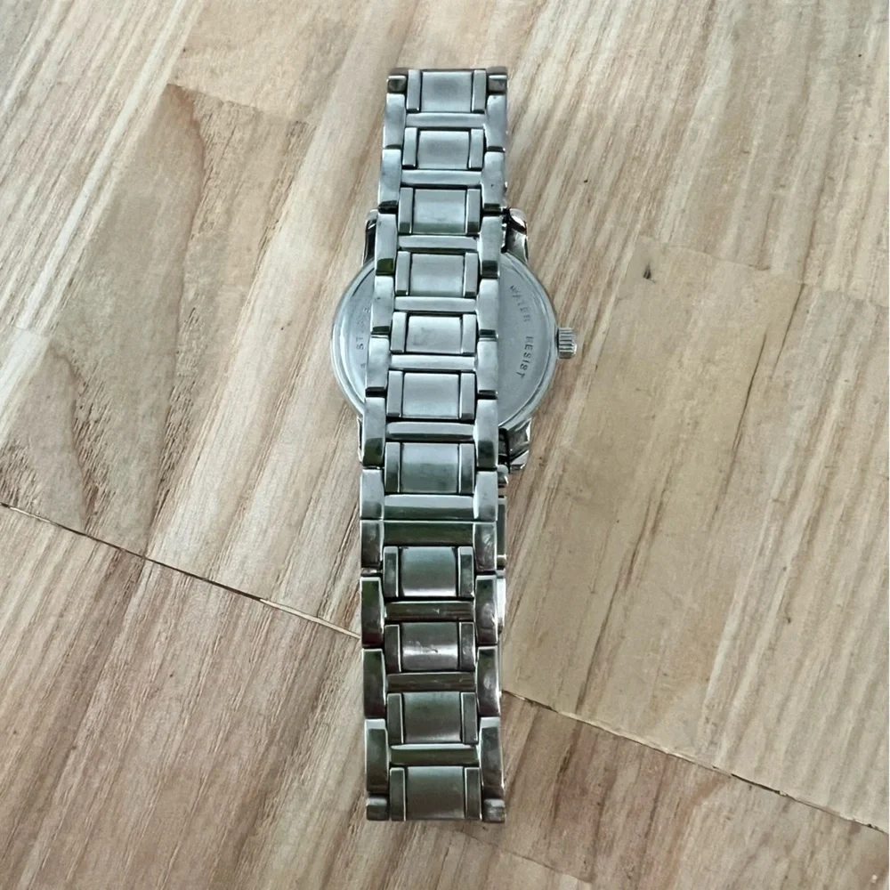 Bulova ladies silver tone diamond dress watch NEW BATTERY